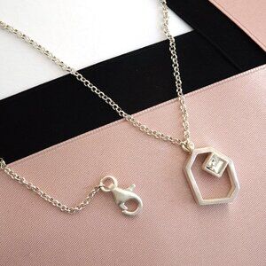 Small Geometric Pendant, Silver, Modern, Chic. Designed by Joidart Barcelona NWT